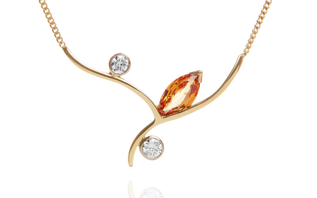 18ct yellow and white gold diamond and mandarin garnet necklace