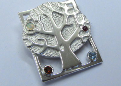 Silver tree brooch with birthstones