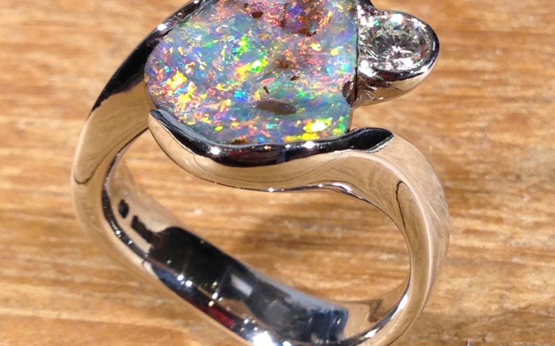 Platinum boulder opal and diamond ring