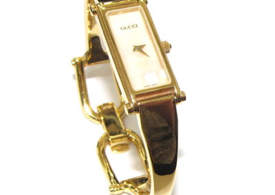 Gucci gold plated ladies bracelet watch