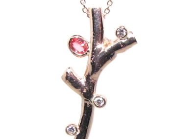9ct rose gold diamond and orange sapphire twig pendant