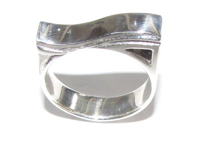 silver ring with geometric head