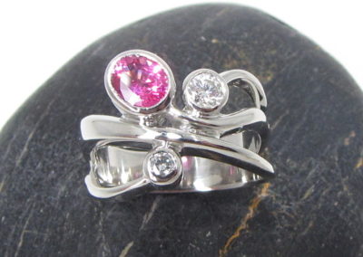 Platinum diamond and pink spinel ring