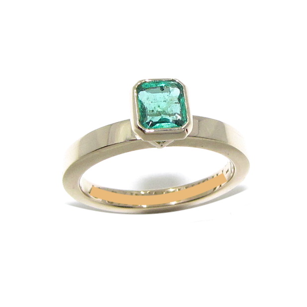 Yellow gold single stone emerald ring