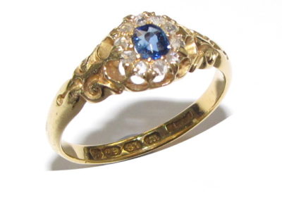 18ct yellow gold 11 stone diamond and sapphire ring