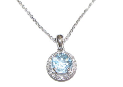 18ct white gold diamond and blue topaz pendant