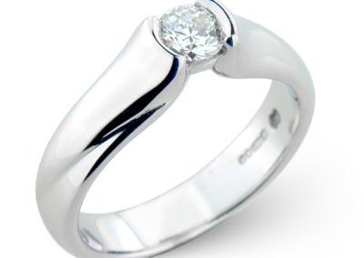 18ct white gold semi rub-over diamond ring