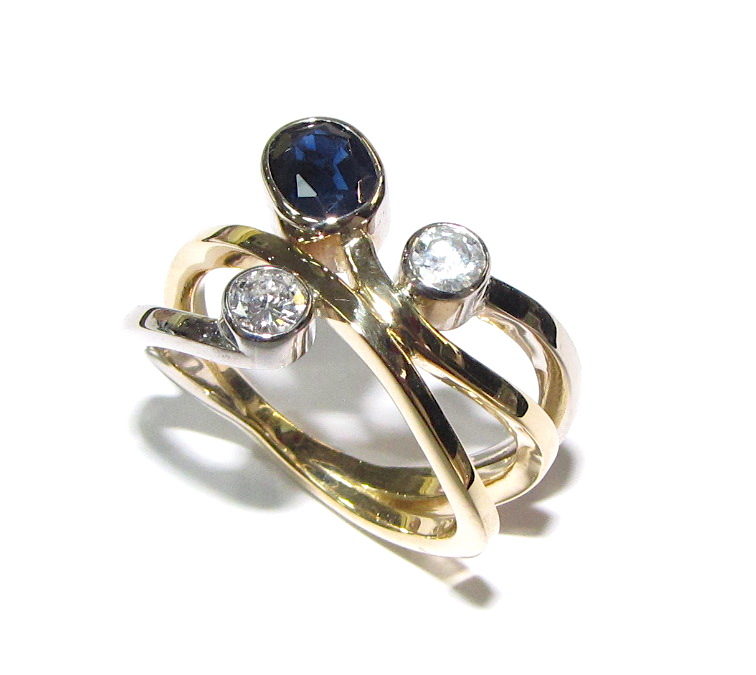 18ct yellow and white gold sapphire and diamond ring