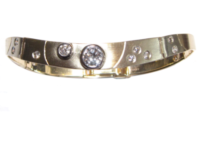 yellow and white gold curved diamond bangle