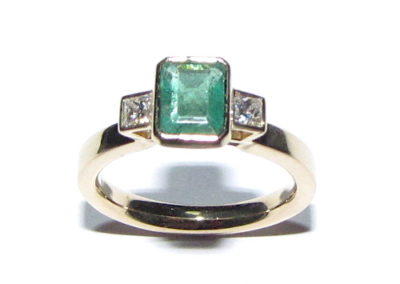 18ct yellow gold emerald and diamond ring