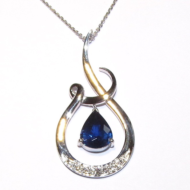 18ct white gold sapphire and diamond pendant