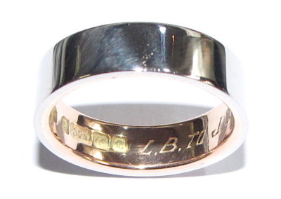 rose gold wedding ring with platinum sleeve