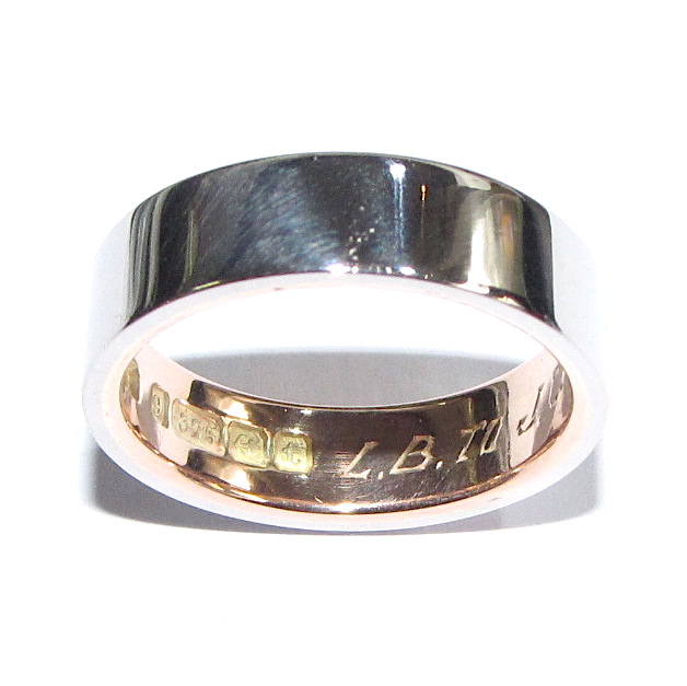 rose gold wedding ring with platinum sleeve